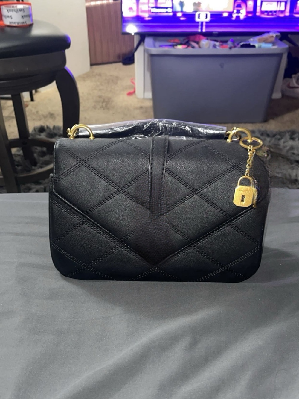 Classic Black Quilted Shoulder Bag with Gold Hardware